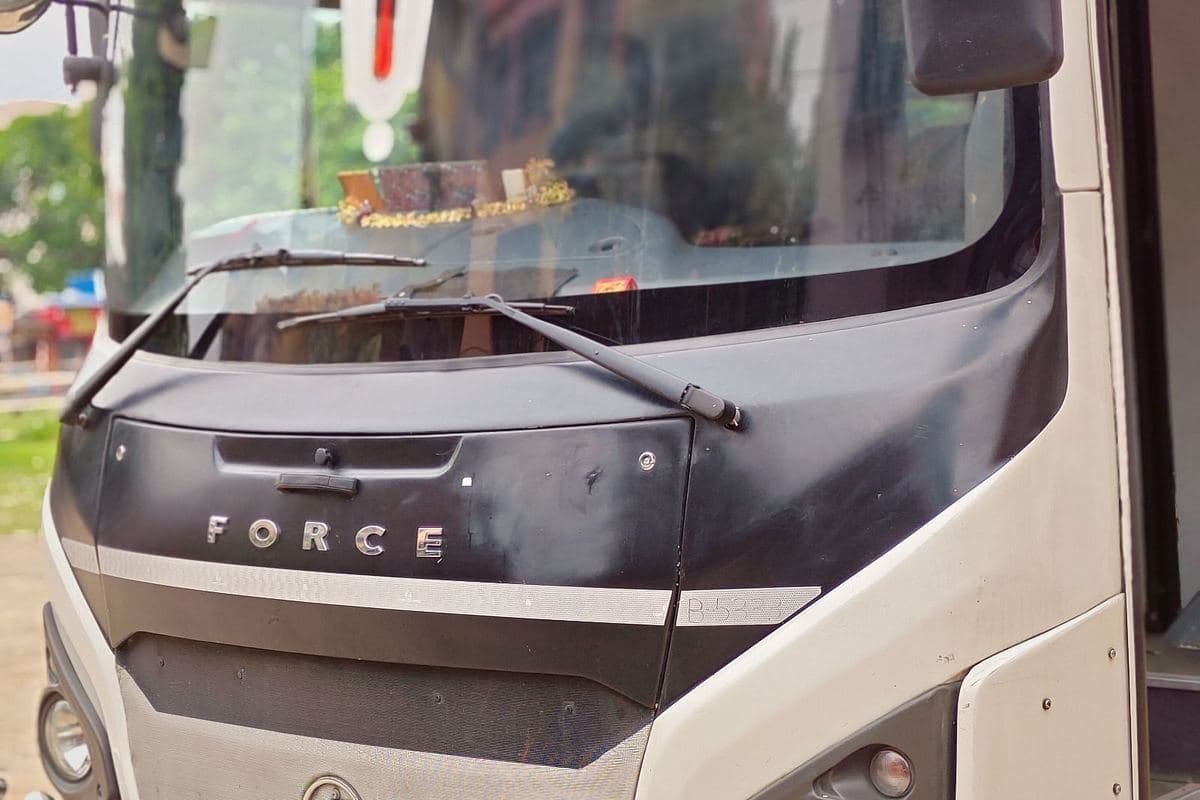 Force chassis grille detail on a P.B. Travels group tour coach, Kolkata