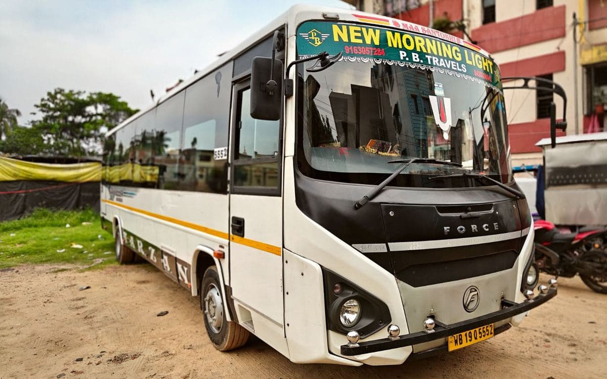 P.B. Travels Force Traveller Monobus group tour coach departing from Kolkata to Digha